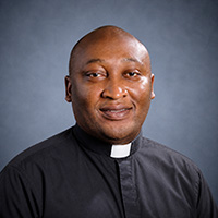Rev. Melchesideck W. Yumo