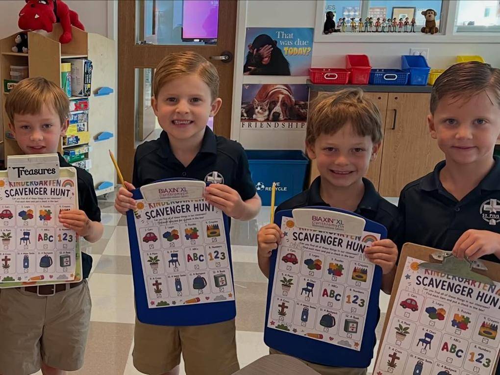 Smiling faces at St. Pius X School in Greensboro.