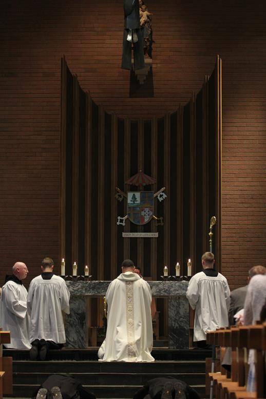 Two Benedictine monks make solemn profession on feast of St. Benedict