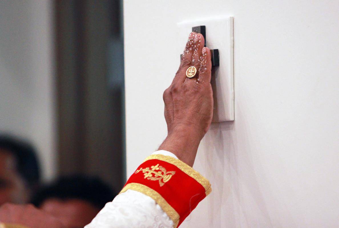 Bishop Jacob Angadiath also anoints each of the four crosses inside the new church with sacred chrism.