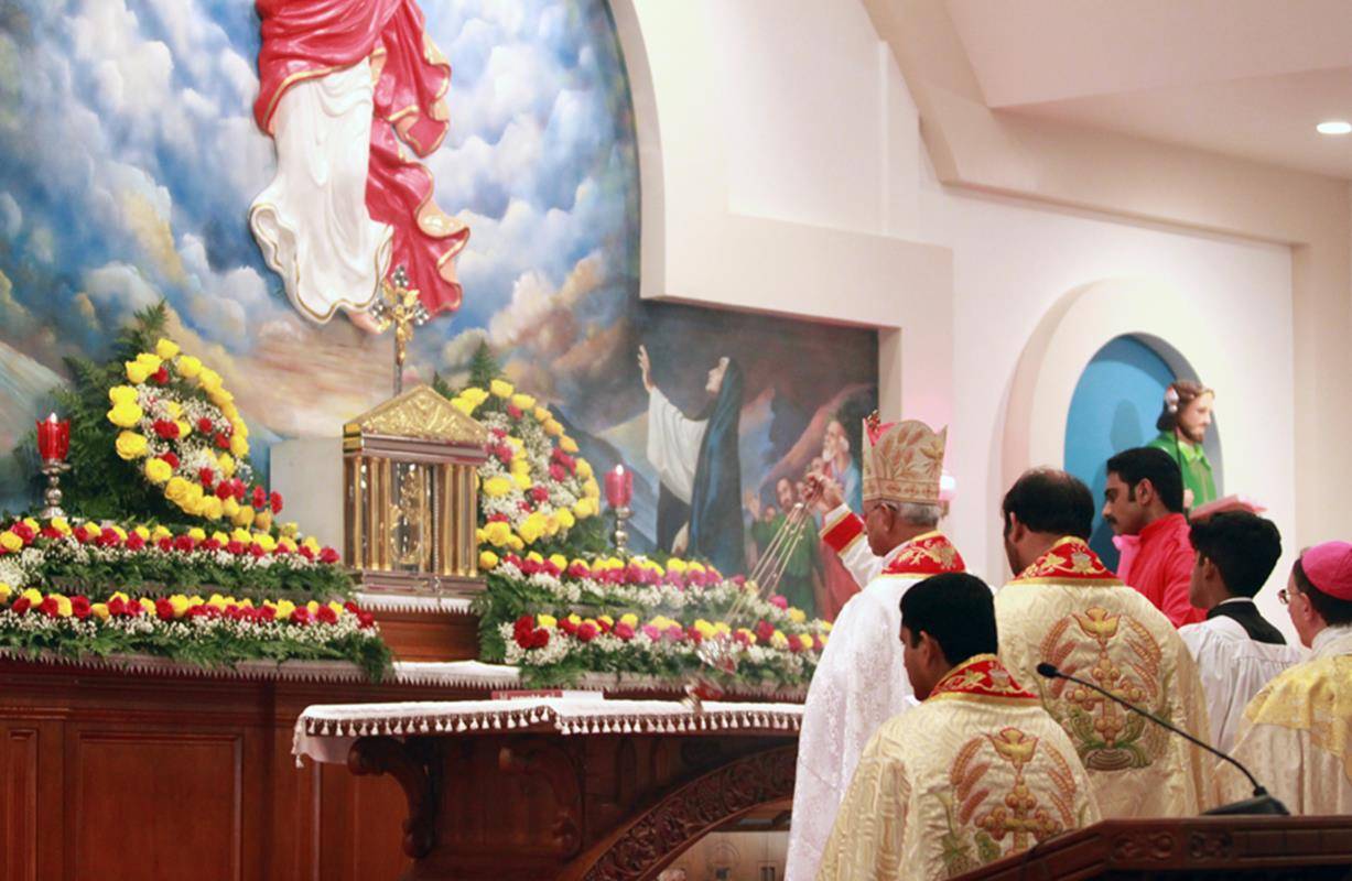 As the Liturgy of the Eucharist begins, Bishop Jacob Angadiath censes the high altar.