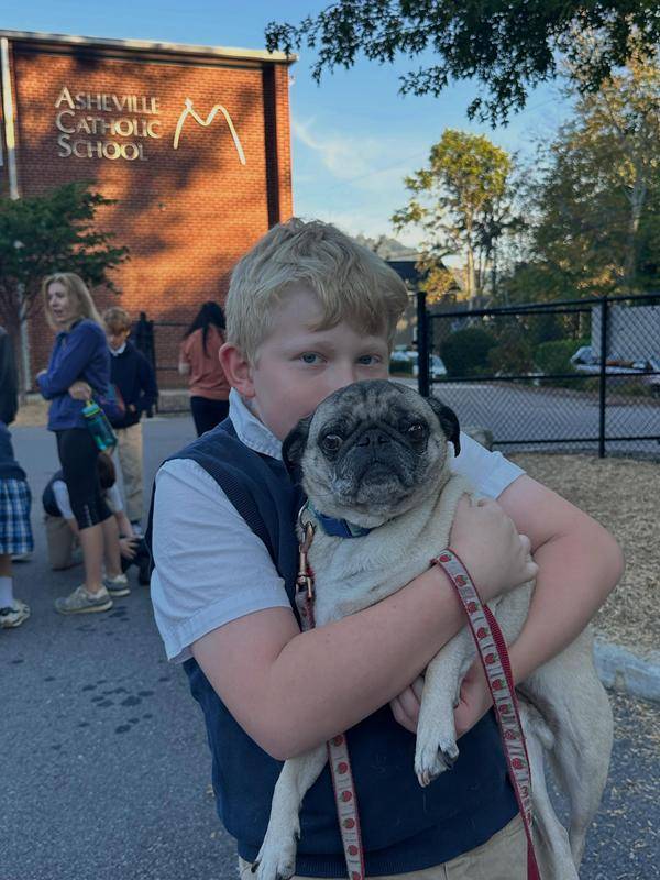 Deacon Mike blessed the pets of Asheville Catholic ahead of the Feast of St. Francis of Assisi. 