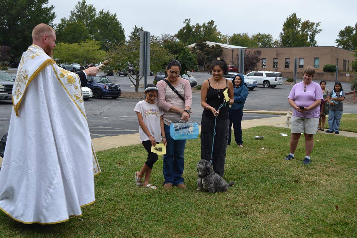 Father Noah Carter, pastor of Holy Cross Parish blessed all types of pets and their owners in Kernersville Saturday. 