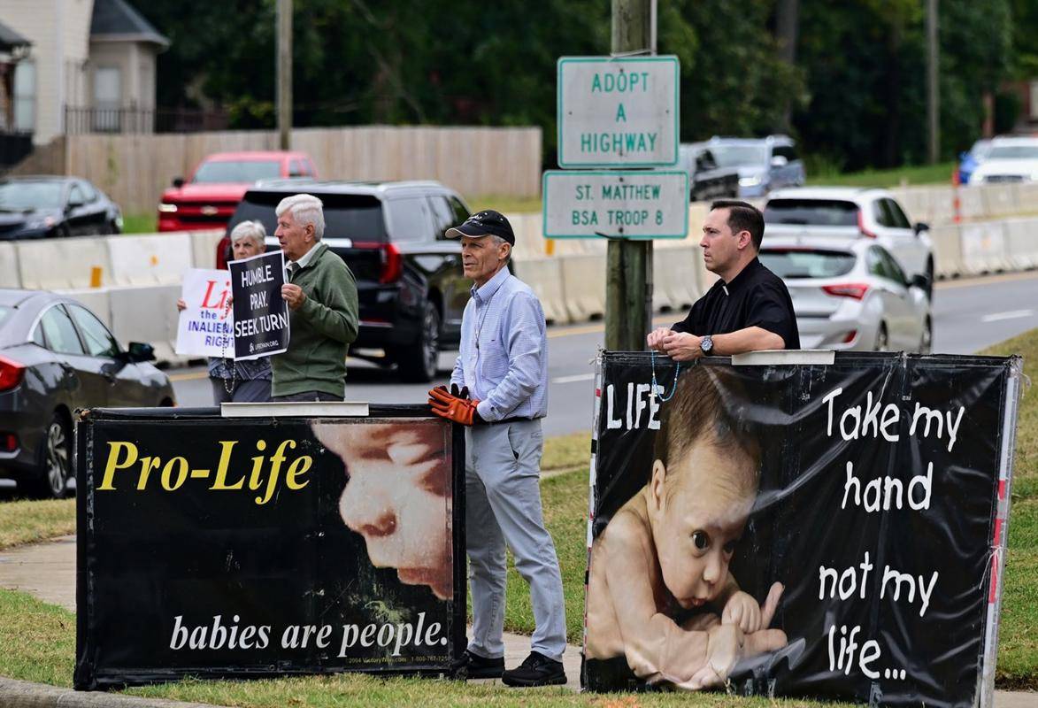 Father Patrick Cahill, St. Matthew Parish in Charlotte prayed the rosary for the sanctity of all human life during the parish’s life chain.