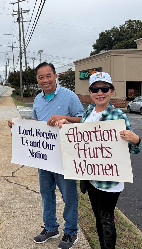 Parishioners from Our Lady of Grace and St. Pius X parishes in Greensboro were joined by the Knights of Columbus and Boy Scouts to stand up for life in their city.
