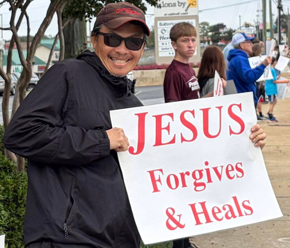 Parishioners from Our Lady of Grace and St. Pius X parishes in Greensboro were joined by the Knights of Columbus and Boy Scouts to stand up for life in their city.