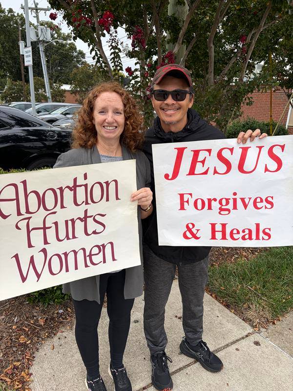 Parishioners from Our Lady of Grace and St. Pius X parishes in Greensboro were joined by the Knights of Columbus and Boy Scouts to stand up for life in their city.