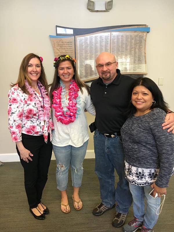 Emily with her parents.