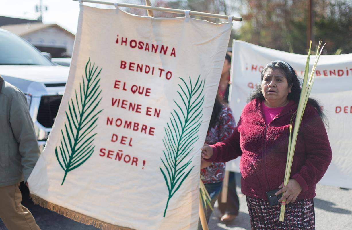 MORGANTON — Members of St. Charles Borromeo Church take part in a Palm Sunday procession March 25. (Photos by Lorenzo Pedro, correspondent)