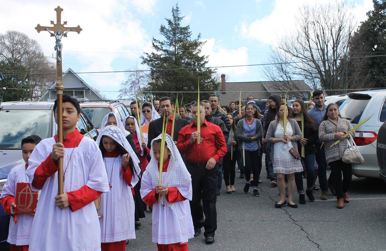 ASHEBORO — Hundreds of Hispanics participate in the procession and celebration of Palm Sunday Mass at St. Joseph Church. The pastor, Father Philip Kollithanath, officiated the liturgy. (Cesar Hurtado, Catholic News Herald)