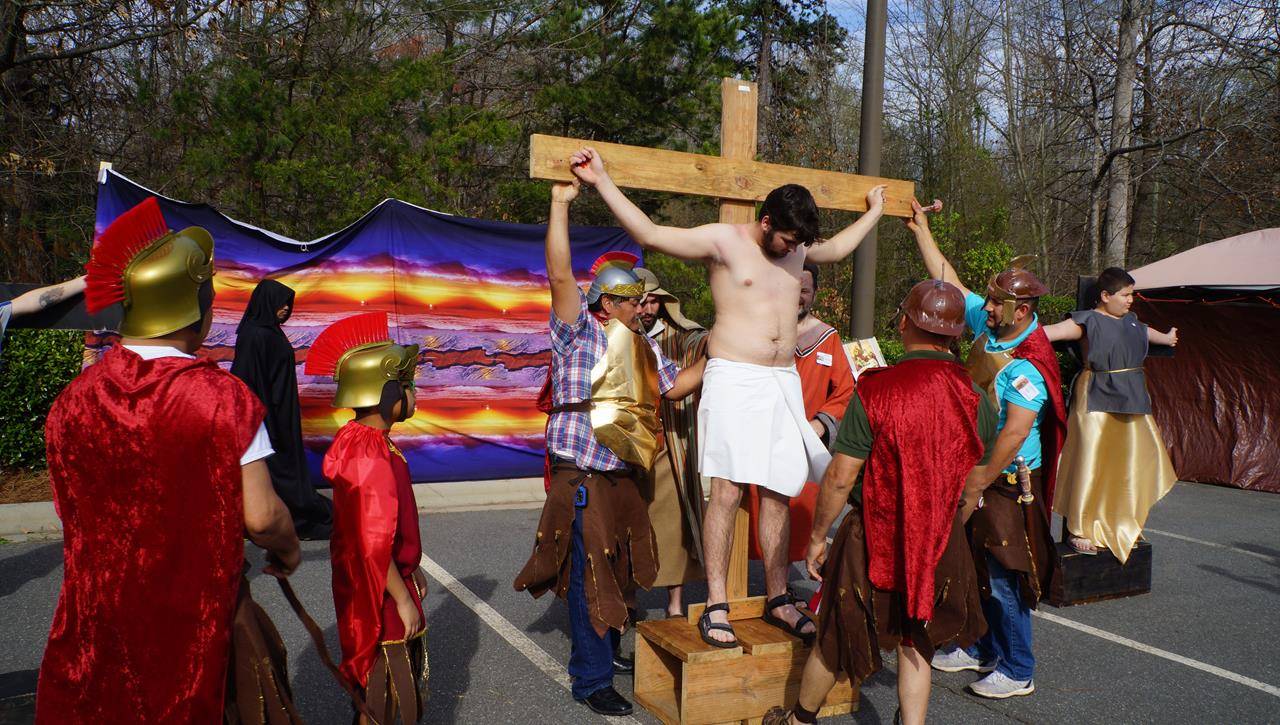 Parishioners at St. Therese Church in Mooresville acted out live Stations of the Cross on Good Friday afternoon. (Photo by John Cosmas, correspondent)