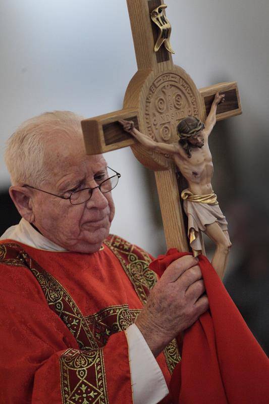 This is the Wood of the Cross held by Deacon Andy Cilone  Immaculate Conception, Forest City (Photo by Giuliana Polinari Riley)