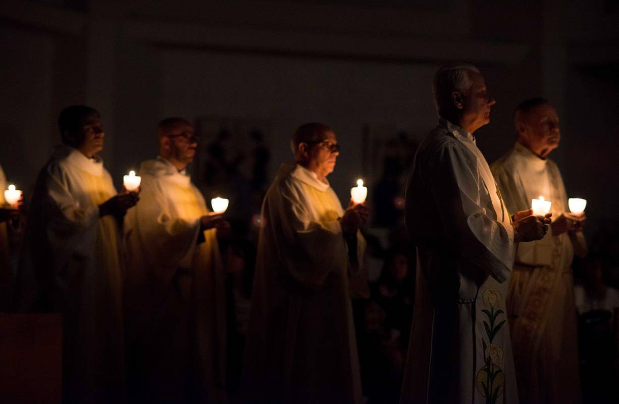 The Easter Vigil begins at St. Matthew Church in Charlotte (Photos by Tara Heilingoetter, correspondent) 