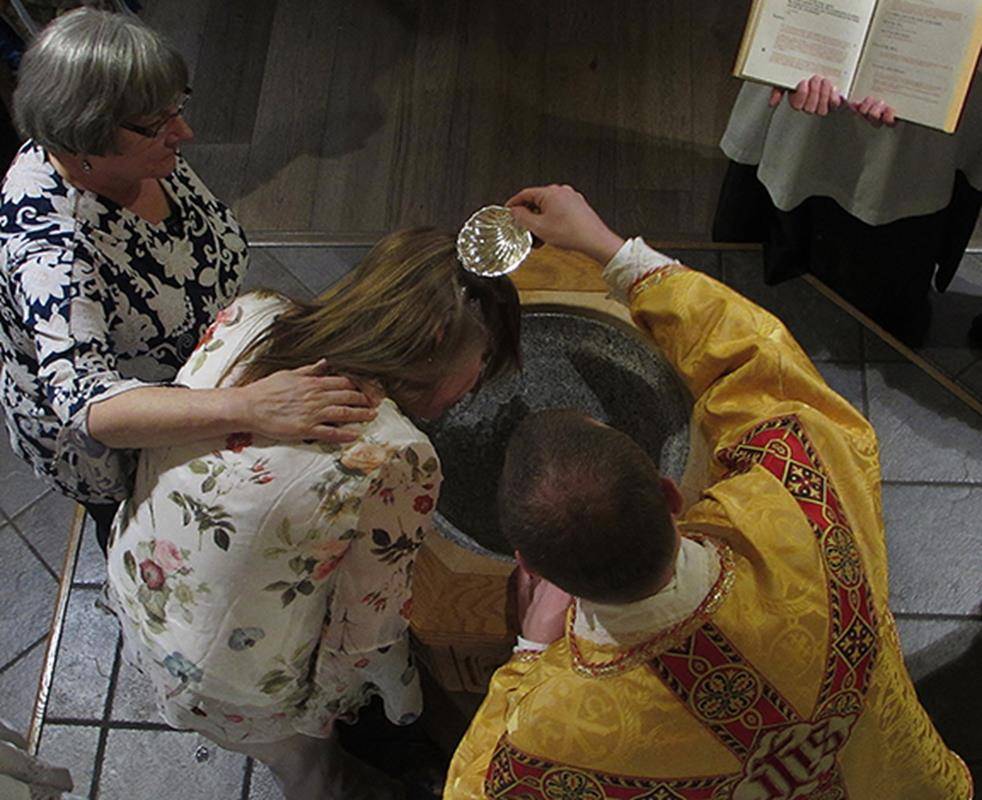 Kristee Kay is baptized at St. Mary, Mother of God Church in Sylva (Photo by Della Sue Bryson, correspondent)