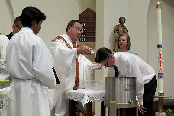 St. Philip Church welcomed six people into the Church during the Easter Vigil March 31 (Photo provided by Connie Ries)