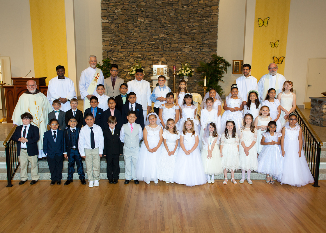 HENDERSONVILLE — Thirty-two children received the sacrament of first Holy Communion recently at Immaculate Conception Church, during Mass celebrated by Capuchin Franciscan Father Martin Schratz, pastor. (Paul Wojcik | Catholic News Herald)