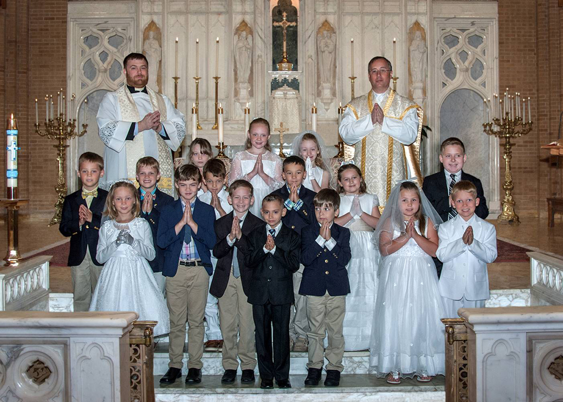 GREENSBORO — Children at Our Lady of Grace Church received their first Holy Communion in May during several Masses celebrated by Father Paul Buchanan, pastor, and Father Christian Cook, parochial vicar. (Photos provided by Melinda Stovall and Rachel Yarbr
