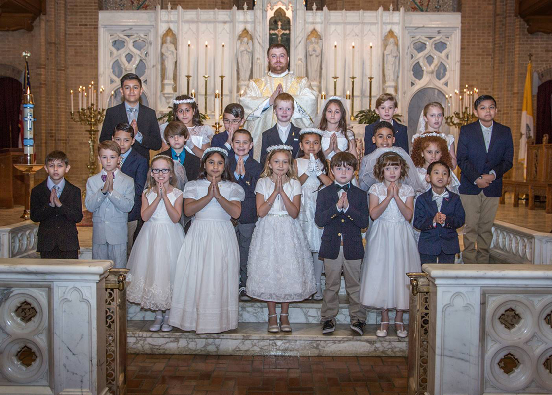 GREENSBORO — Children at Our Lady of Grace Church received their first Holy Communion in May during several Masses celebrated by Father Paul Buchanan, pastor, and Father Christian Cook, parochial vicar. (Photos provided by Melinda Stovall and Rachel Yarbr