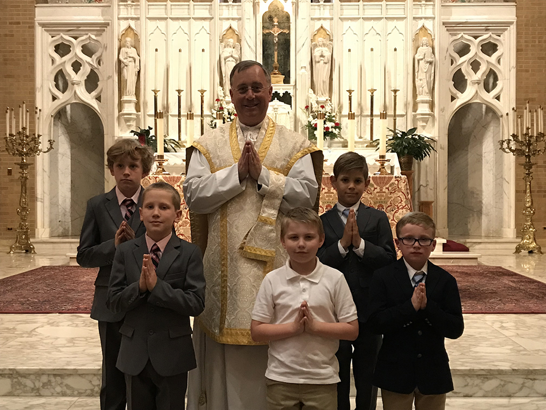 GREENSBORO — Children at Our Lady of Grace Church received their first Holy Communion in May during several Masses celebrated by Father Paul Buchanan, pastor, and Father Christian Cook, parochial vicar. (Photos provided by Melinda Stovall and Rachel Yarbr