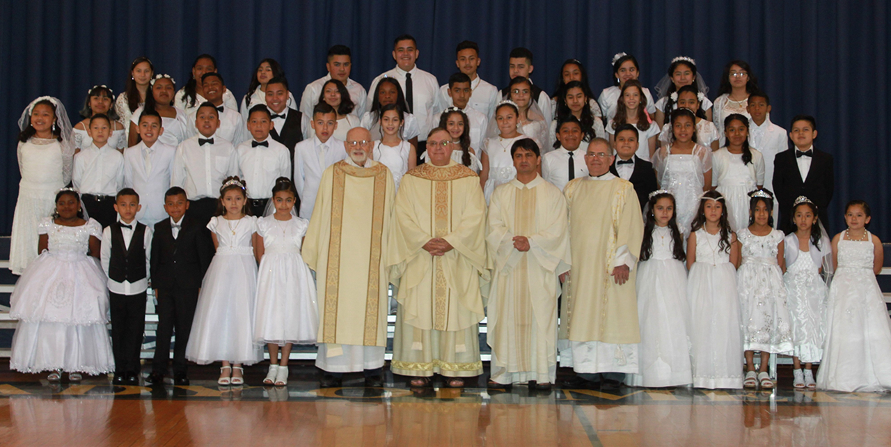 WINSTON-SALEM — Children at Our Lady of Mercy Church received their first Holy Communion during two Masses in May. After both Masses, children crowned a statue of Mary. (Photos provided by Jeanette Sprenkle)