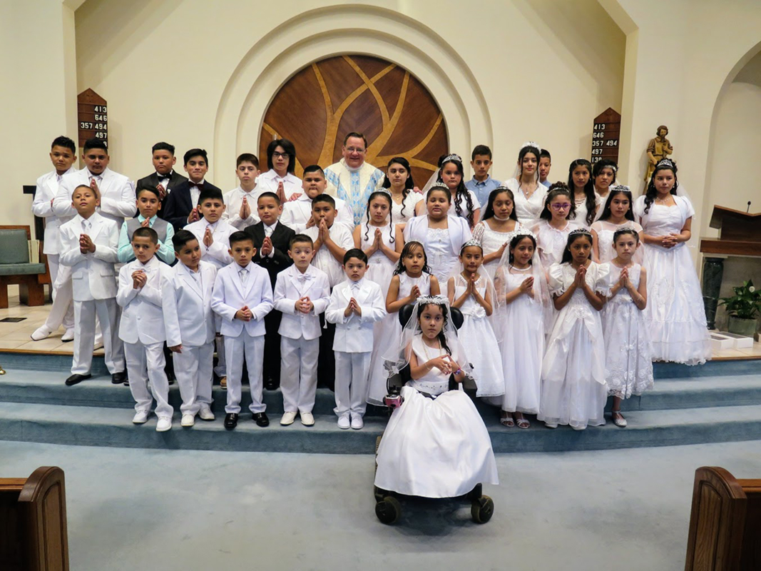 STATESVILLE — On May 6, 52 children received their first Holy Communion at St. Philip the Apostle Church: 16 at the 10:30 a.m. English-language Mass and 36 at the 12:30 p.m. Spanish-language Mass. Father Thomas Kessler, pastor, celebrated both liturgies.