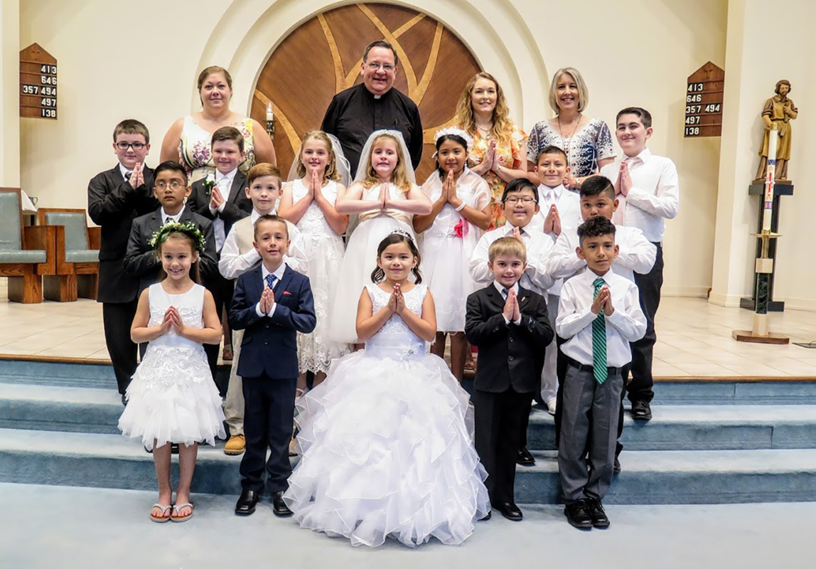 STATESVILLE — On May 6, 52 children received their first Holy Communion at St. Philip the Apostle Church: 16 at the 10:30 a.m. English-language Mass and 36 at the 12:30 p.m. Spanish-language Mass. Father Thomas Kessler, pastor, celebrated both liturgies.