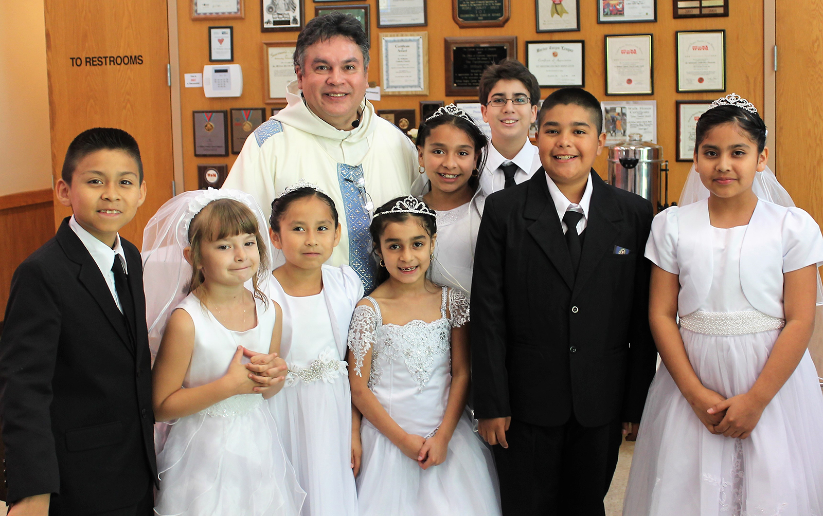 MURPHY — Eight children at St. William Church celebrated the sacrament of first Holy Communion May 6, during Mass offered by Father Alejandro Ayala, pastor. (Photo provided by Miranda Hall and Chris Hall)