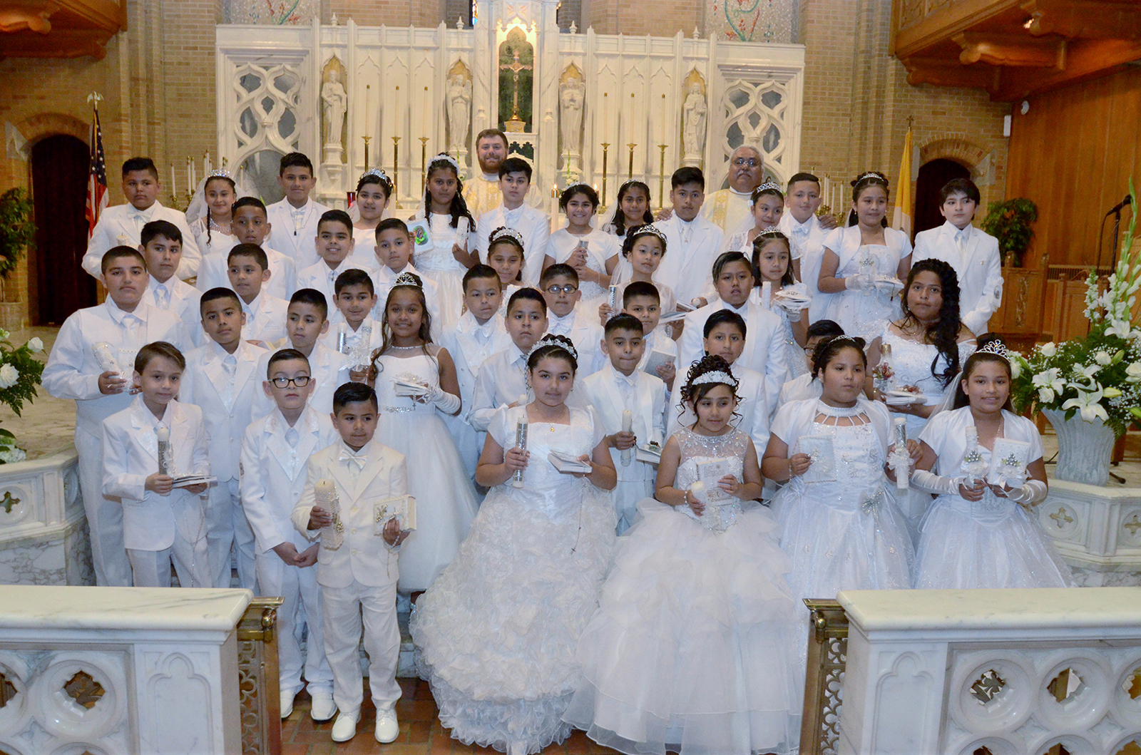 GREENSBORO — Children at Our Lady of Grace received the sacrament of first Holy Communion during two Masses celebrated June 3 by their pastor, Father Paul Buchanan. (Photos provided by Normalinda Gonzalez Hammond)
