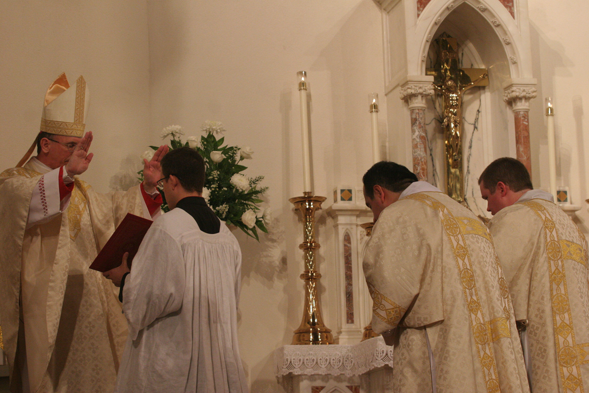 Bishop Jugis ordains two men to transitional diaconate June 2