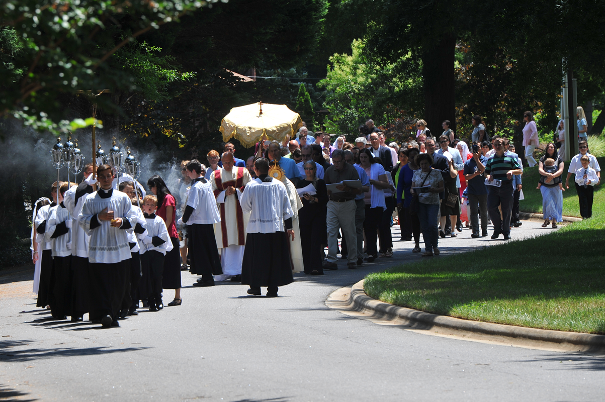 CHARLOTTE — Corpus Christi procession at St. Ann Church. (Photos by Markus Kuncoro)