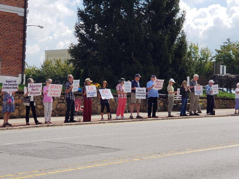 Parishioners of Sacred Heart Church, Brevard, participate in the annual Life Chain demonstration. (Photo by Dorice Narins)