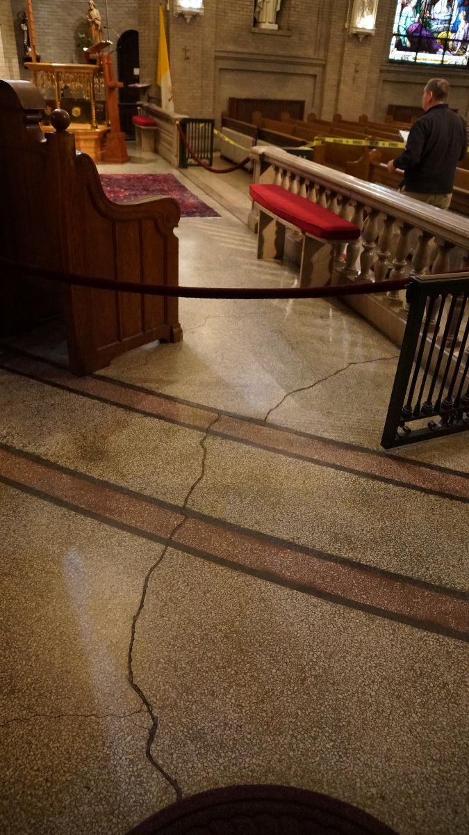 Cracks are also present in the terrazzo floors.