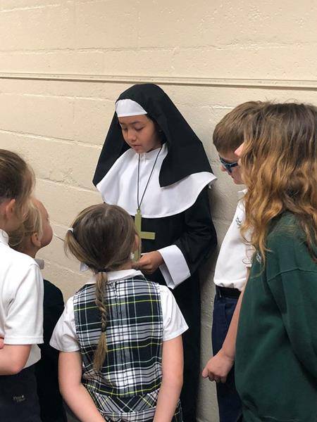GASTONIA — Fourth-graders at St. Michael Church presented their Saint projects to other grade levels and parents. They identified what saint they were, and gave a brief description about their life. (Photos via Facebook)