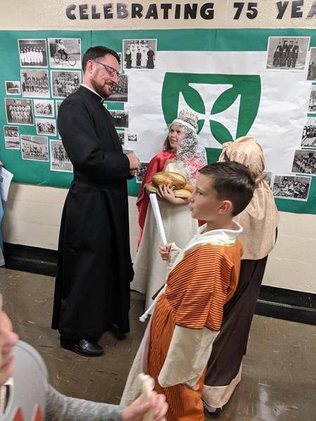 GASTONIA — Fourth-graders at St. Michael Church presented their saint projects to other grade levels and parents. They identified what saint they were, and gave a brief description about their life. (Photos via Facebook)