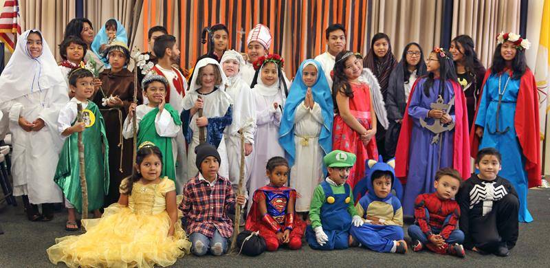 SHELBY — St. Mary Help of Christians Parish held a “Saints and Heroes” party after the 1 p.m. Mass Oct. 28. Prizes were awarded for original and creative costumes. (Photos by Giuliana Polinari Riley, correspondent)