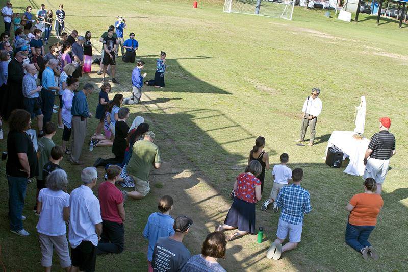 CHARLOTTE — More than 80 people gathered on the Feast of Our Lady of the Rosary at Holy Trinity Middle School to participate in the nation’s first coast-to-coast rosary rally. (Photo provided by James Sarkis; Mike FitzGerald | Catholic News Herald)