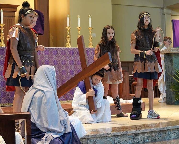 HUNTERSVILLE — St. Mark Catholic School students perform a living presentation of the Stations of the Cross. (Photo provided by Amy Burger) 