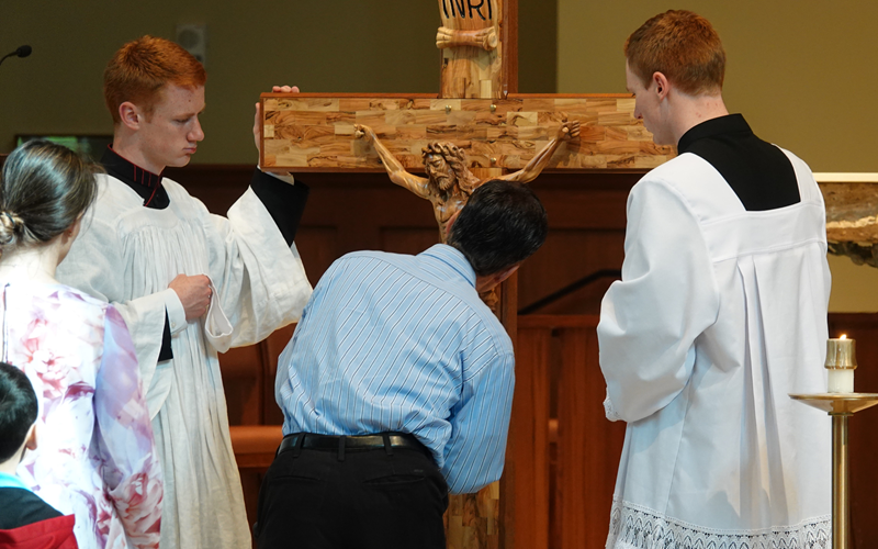 HUNTERSVILLE — Passion and Veneration of the Cross at St. Mark Church on Good Friday. (Photo provided by Amy Burger)
