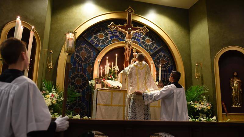 A Latin Mass was offered at Easter at Charlotte Catholic High School. (Photo by Markus Kuncoro)