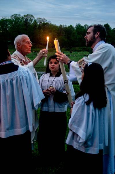 Lighting the Paschal candle at Our Lady of the Highways Church in Thomasville. (Photo by Joe Thornton)