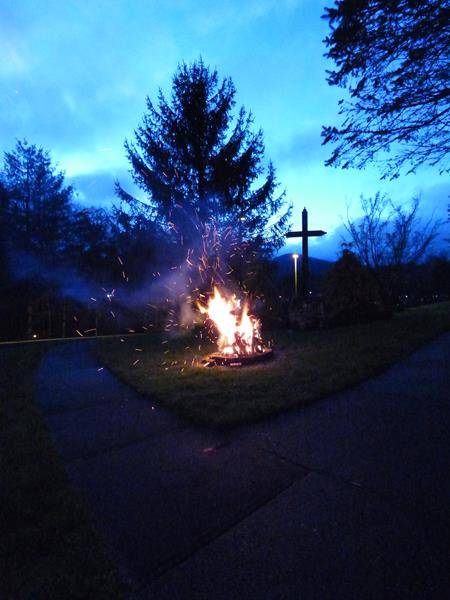 The Paschal fire is lit at St. Elizabeth Church in Boone. (Photo by Amber Mellon)