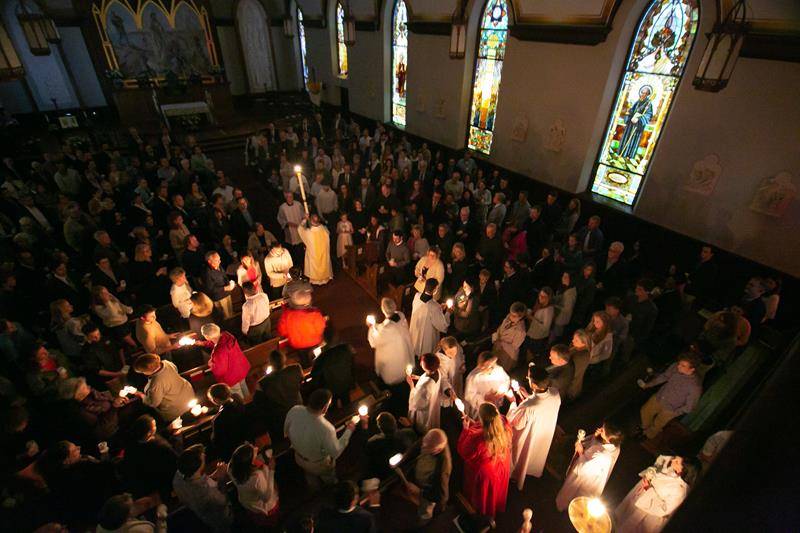 The Easter Vigil at St. Peter Church in Charlotte.  (Photo by Todd Hess)