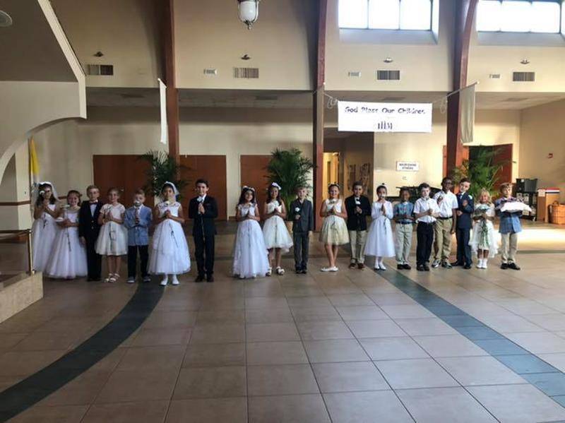 HIGH POINT — Immacomeschool (Copy)ulate Heart of Mary school honors Mary, with a special Mass led by the second grader who came dressed in their First Communion finest. (Photo via Facebook)