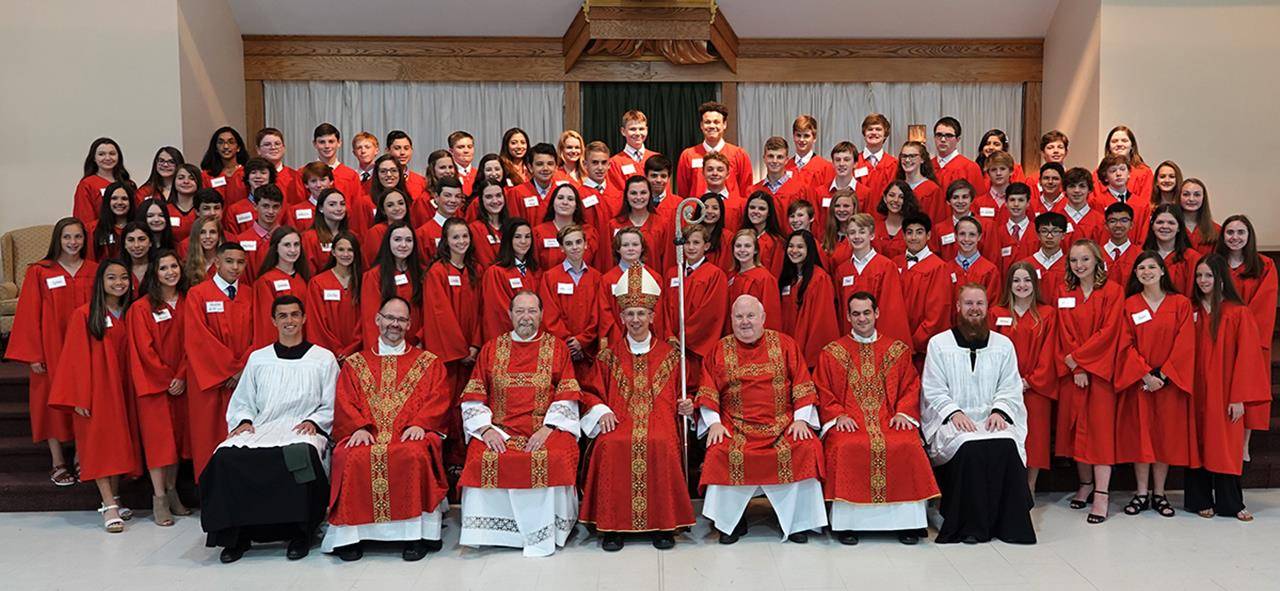 Eighty-four teenagers at St. Mark Church in Huntersville received the sacrament of confirmation from Bishop Peter Jugis during Mass May 16. In his homily, Bishop Jugis entreated the young people to put God first in their lives and trust the Holy Spirit. “