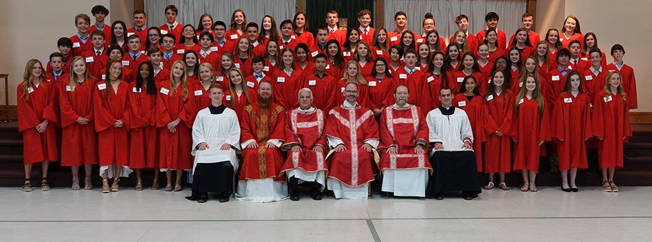 Another 82 teenagers received the sacrament of confirmation from Father John Putnam, pastor, during Mass May 25.