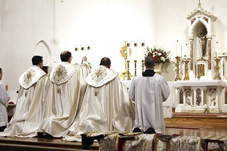 Bishop Peter Jugis led a Holy Hour June 20 at St. Patrick Cathedral for the three men being ordained priests for the Diocese of Charlotte.