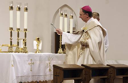 Bishop Jugis blessed each future priest's chalice which he will use at his first Mass on June 23.