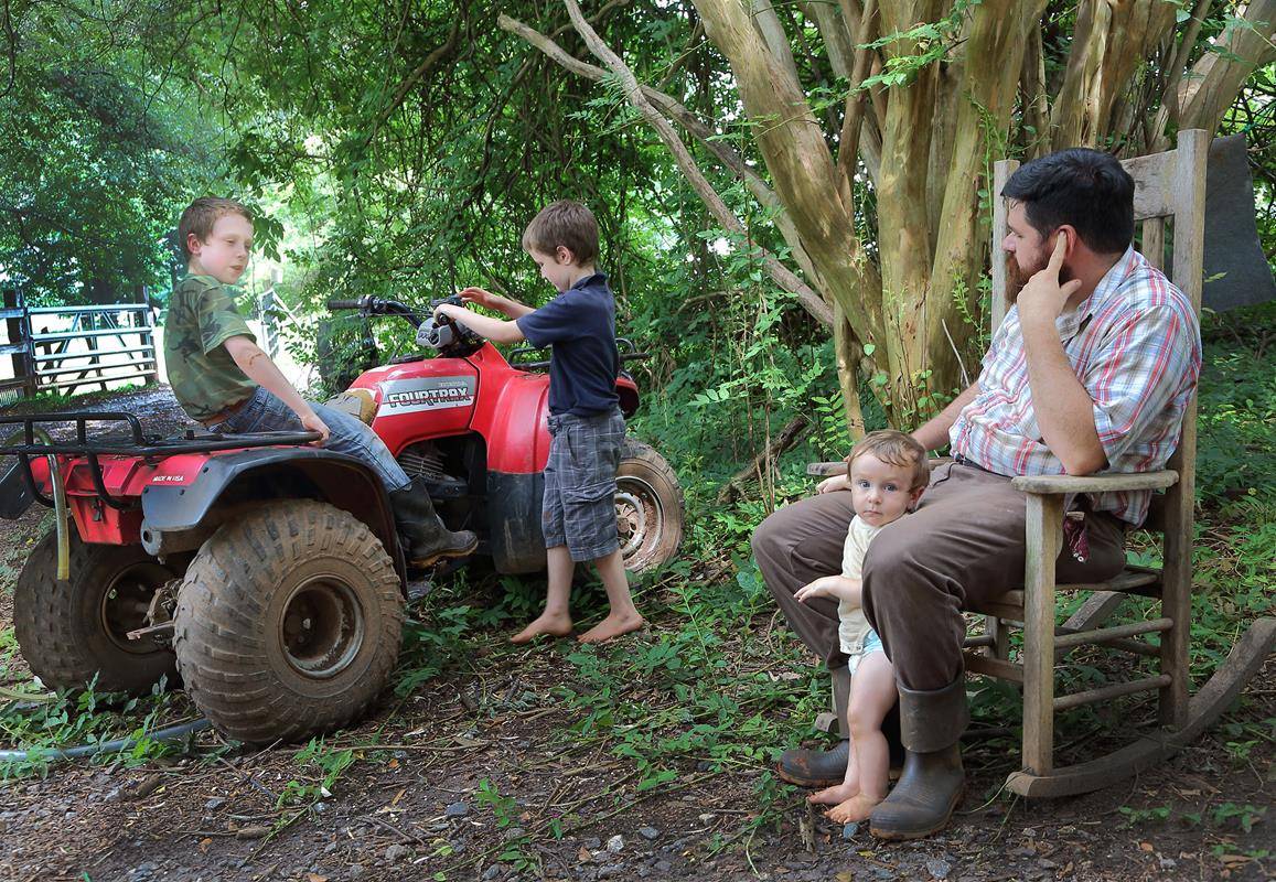 Consulting dad on starting the tructor (Copy)