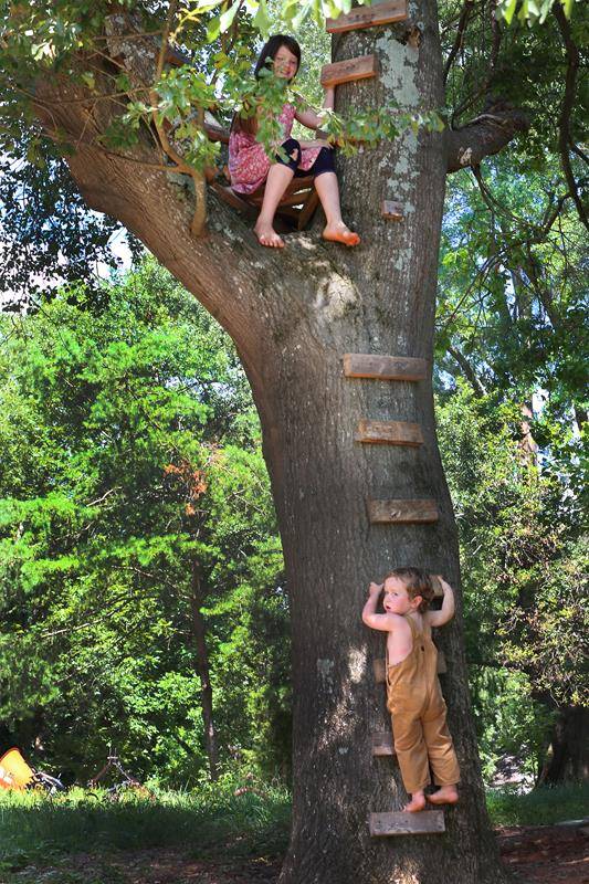 Joseph attempting to climb to his sister (Copy)