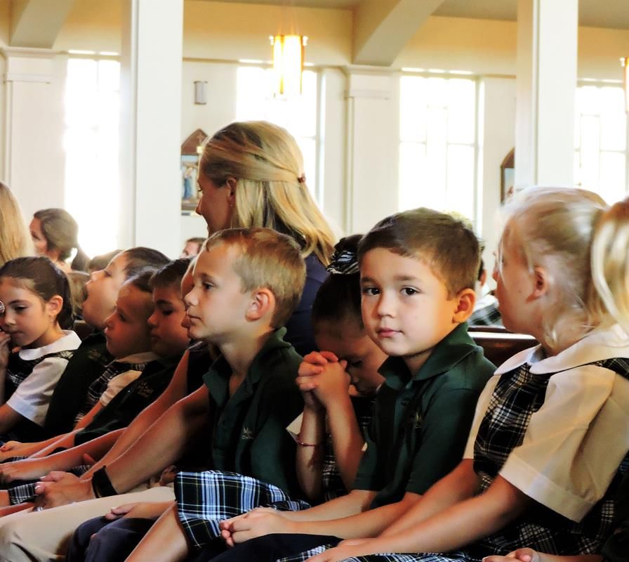 Kindergarteners at their first all-school Mass